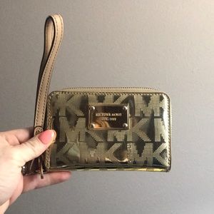 Gold Michael kors wristlet
